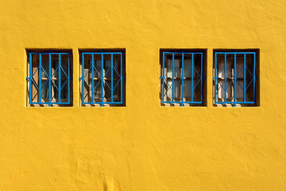 Painted exterior wall and structural protection